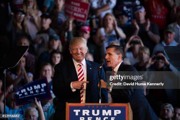 Republican Presidential Nominee Donald Trump and retired Lieutenant General Mike Flynn at a rally inside an aircraft hangar, Grand Junction,...