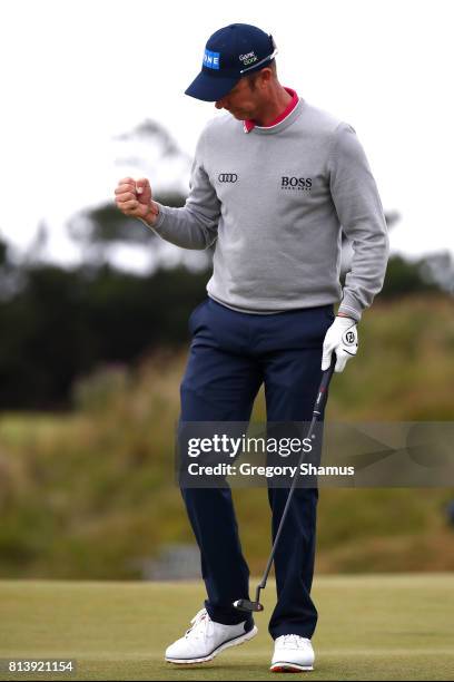 Mikko Ilonen of Finland celebrates a putt on the 8th green during day one of the AAM Scottish Open at Dundonald Links Golf Course on July 13, 2017 in...