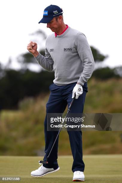 Mikko Ilonen of Finland celebrates a putt on the 8th green during day one of the AAM Scottish Open at Dundonald Links Golf Course on July 13, 2017 in...