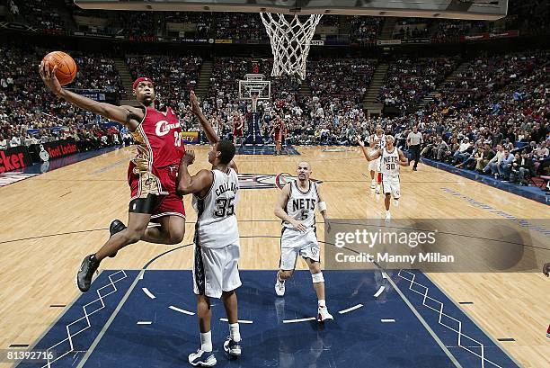 Basketball: Cleveland Cavaliers LeBron James in action vs New Jersey Nets Jason Collins , East Rutherford, NJ 1/2/2004