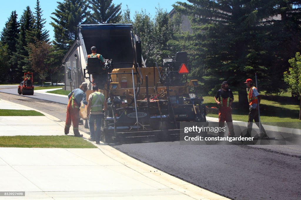 Crew And Equipment Building Totally New Residential Road