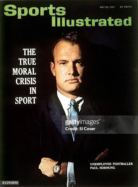 May 20, 1963 Sports Illustrated via Getty Images Cover, Football: Closeup portrait of former Green Bay Packers player Paul Hornung serving one-year...