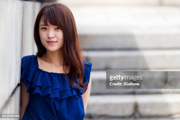 portrait of a confident young asian woman - cute teens stock pictures, royalty-free photos & images