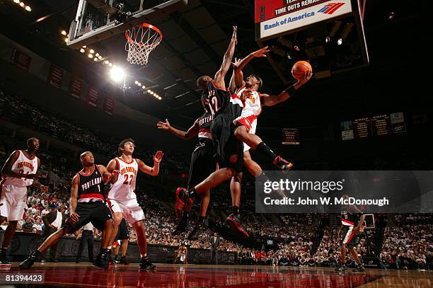 Basketball: Atlanta Hawks Josh Smith in action vs Portland Trail Blazers Theo Ratliff , Portland, OR 11/5/2005