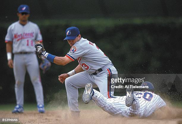 Baseball: Montreal Expos Jose Vidro in action, tagging out Chicago Cubs Chad Meyers at 2nd base, Chicago, IL 6/16/2000