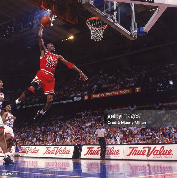 Basketball: NBA Playoffs, Chicago Bulls Michael Jordan in action, making dunk vs Philadelphia 76ers, Game 3, Philadelphia, PA 5/10/1991