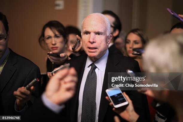 Sen. John McCain leaves a meeting where a new version of a GOP healthcare bill was unveiled to Republican senators at the U.S. Capitol July 13, 2017...