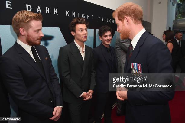 Actors Jack Lowden, Harry Styles and Aneurin Barnard are greeted by Prince Harry at the 'Dunkirk' World Premiere at Odeon Leicester Square on July...