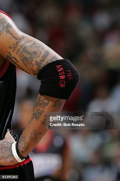 Basketball: Closeup of Philadelphia 76ers Allen Iverson arm with tattoo and sweatband, equipment during game vs Orlando Magic Orlando, FL