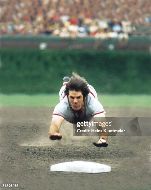 Baseball: Cincinnati Reds Pete Rose in action, diving into third base during slide vs Chicago Cubs, Chicago, IL 8/29/1975