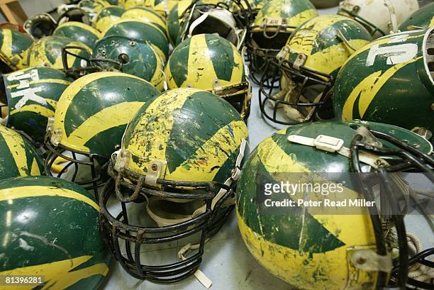 Football: Closeup of Leone High helmets, equipment, Pago Pago, ASM 7/24/2003