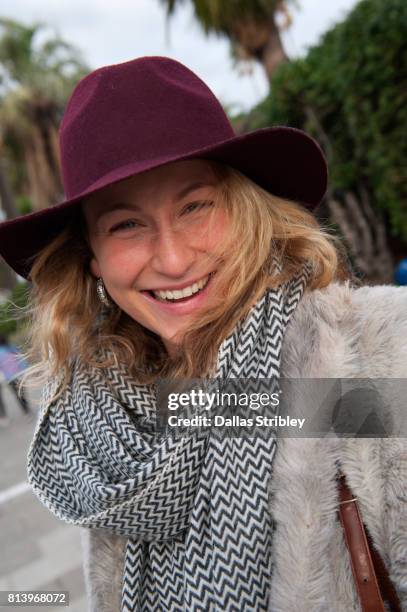 st kilda street-style - close up of beautiful young blonde woman with black hat stock pictures, royalty-free photos & images