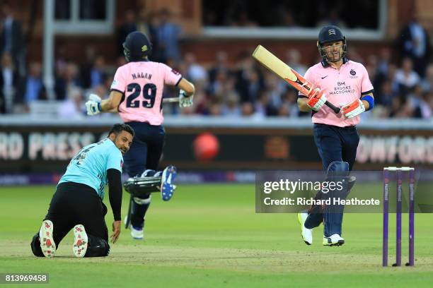 Brendon McCullum of Middlesex hits the ball back past Ravi Rampaul of Surrey during the NatWest T20 Blast match between Middlesex and Surrey at...