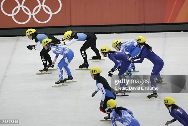 Short Track Skating: 2006 Winter Olympics, South Korea Chun-Sa Byun and Yun-Mi Kang in action vs Italy Marta Capurso and Arianna Fontana during...