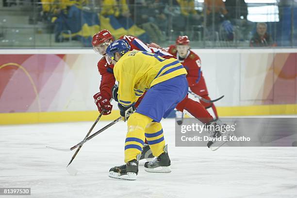 Hockey: 2006 Winter Olympics, Russia Alexei Yashin in action vs Sweden during Preliminary Round - Group B game at Palasport Olimpico, Turin, Italy...