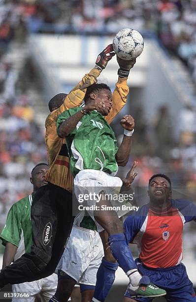 Soccer: World Cup Qualifying, Liberia goalie Koming Koming in action, making save vs Sierra Leone, Monrovia, Liberia 2/24/2001