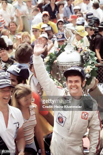 Auto Racing: Indianapolis 500, Al Unser victorious with Borg-Warner Trophy after winning race at Motor Speedway, Indianapolis, IN 5/28/1978