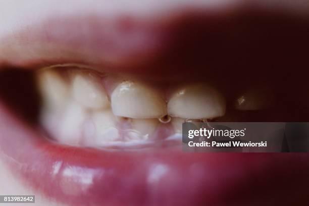 boy's teeth - saliva substância orgânica imagens e fotografias de stock