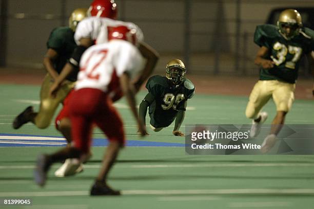 High School Football: Colonel White HS Bobby Martin in action, chasing punt returner vs Belmont High, Dayton, OH 9/24/2005