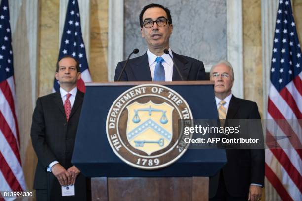 Treasury Secretary Steven Mnuchin speaks as Health and Human Services Secretary Tom Price and Labor Secretary Alexander Acosta look on during a press...