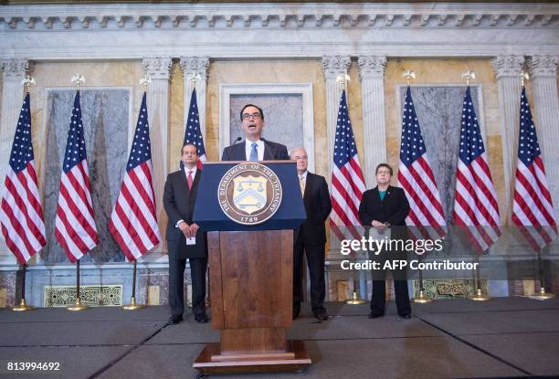 Treasury Secretary Steven Mnuchin speaks as Labor Secretary Alexander Acosta, Health and Human Services Secretary Tom Price and Social Security...