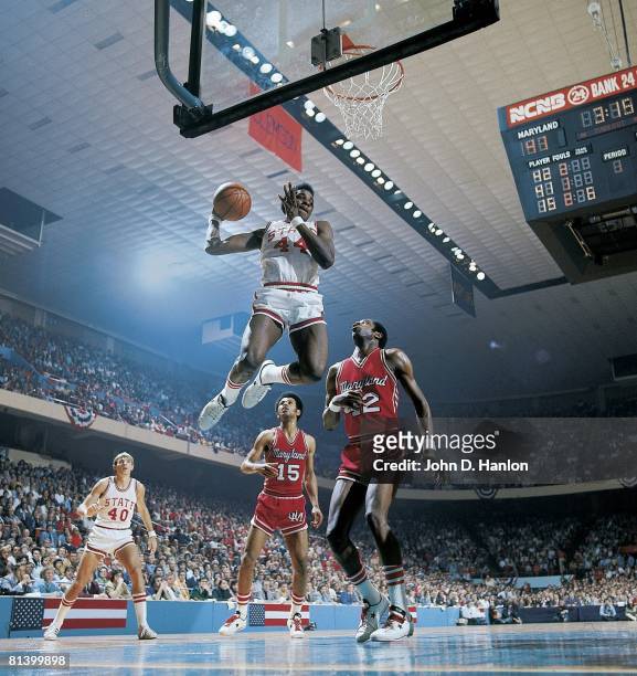 Coll, Basketball: NCAA playoffs, North Carolina State's David Thompson in action vs Maryland's Owen Brown , Greensboro, NC 3/9/1974