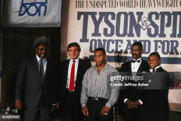 Promoter Don King Businessman Donald Trump Boxer 'Iron' Mike Tyson Boxer Michael Spinks with his manager and promoter Butch Lewis at Tyson Spinks...