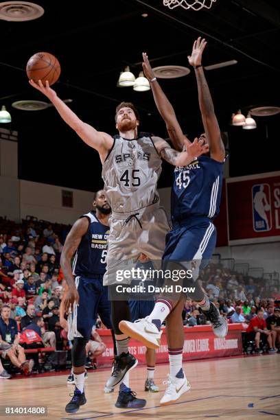 Shayne Whittington of the San Antonio Spurs drives to the basket against the New Orleans Pelicans during the 2017 Las Vegas Summer League game on...