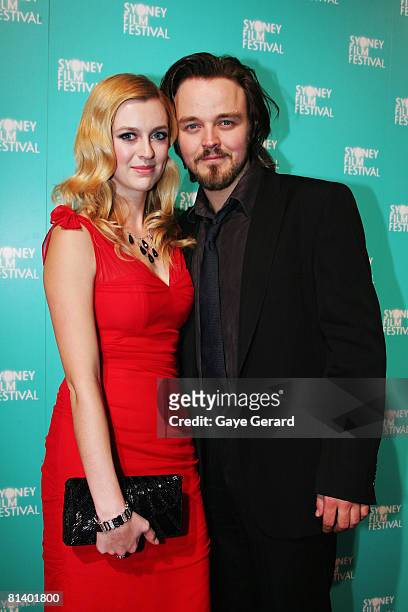 Gracie Otto and Matthew Newton attends the opening gala night and premiere of 'Happy-Go-Lucky' during the 55th Sydney Film Festival at the State...