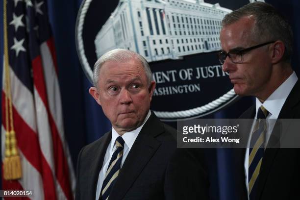 Attorney General Jeff Sessions and Acting FBI Director Andrew McCabe during a news conference to announce significant law enforcement actions July...