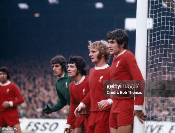 Liverpool goalkeeper Ray Clemence is joined in defence by Kevin Keegan, Alec Lindsay and Emlyn Hughes, circa 1974. .
