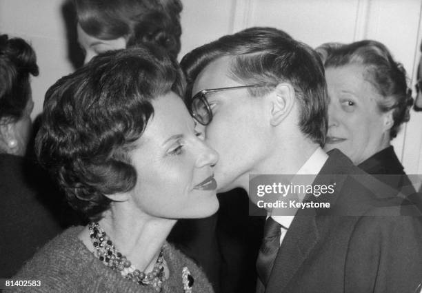 French fashion designer Yves Saint Laurent greets his mother after the success of his new spring and summer collection for Dior, Paris, 29th January...