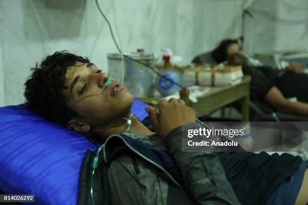 Syrians receive medical treatment after Assad regime's alleged chemical gas attack over oppositions' frontline, where is included in deconfliction...