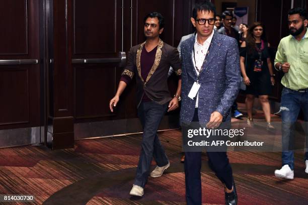 Bollywood actor Nawazuddin Siddiqui arrives for a press conference ahead of the 18th International Indian Film Academy Festival, in New York City...