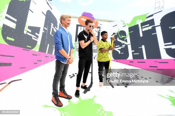 Olympic snowboarder Shaun White with actors Thomas Kuc and Benjamin Flores Jr. Attend Nickelodeon Kids' Choice Sports Awards 2017 at Pauley Pavilion...