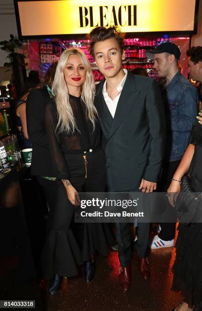 Lou Teasdale and Harry Styles attend the launch of Bleach London's new makeup and hair collections on July 13, 2017 in London, England.