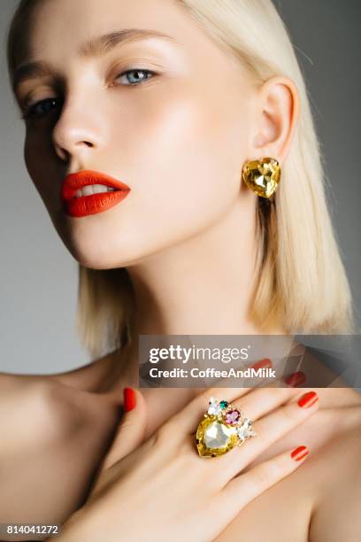 portrait of a nice looking woman - woman with red lipstick stock pictures, royalty-free photos & images
