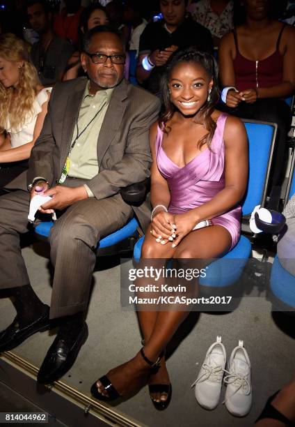 Olympic gymnast Simone Biles and Ronald Biles attend Nickelodeon Kids' Choice Sports Awards 2017 at Pauley Pavilion on July 13, 2017 in Los Angeles,...
