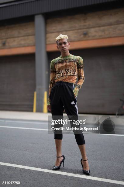 Mateo Palacio is seen attending General Idea & Raun LaRose during Men's New York Fashion Week wearing Adidas pants, Jimmy Choo shoes, and a Jean-Paul...