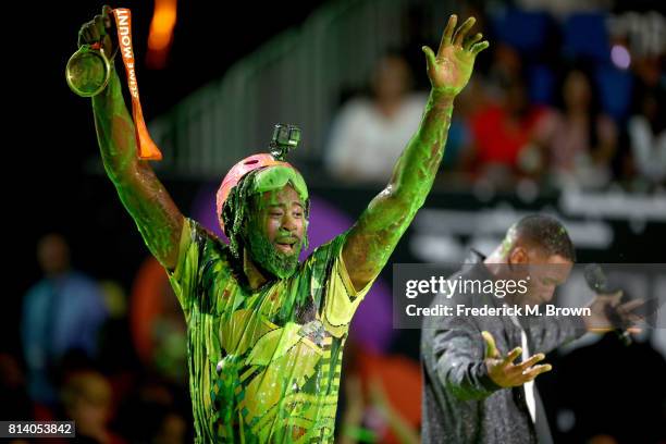 Player DeAndre Jordan reacts after getting slimed during Nickelodeon Kids' Choice Sports Awards 2017 at Pauley Pavilion on July 13, 2017 in Los...