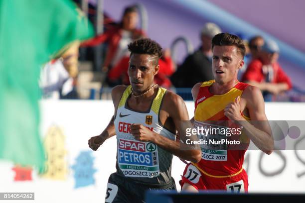 Carlos Mayo of Spain and Amanal Petros of Germany are seen leading the mens 10000 meter final on 13 July, 2017 during the U23 European Athletics...