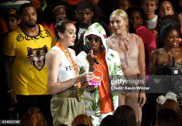 Player Prince Fielder, WNBA player Breanna Stewart, TV personality Nick Cannon, and Olympic skier Lindsey Vonn speak onstage during Nickelodeon Kids'...