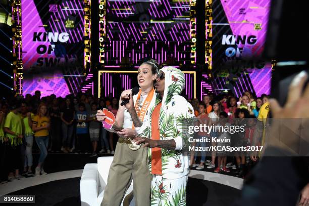 Player Breanna Stewart and TV personality Nick Cannon speak onstage during Nickelodeon Kids' Choice Sports Awards 2017 at Pauley Pavilion on July 13,...