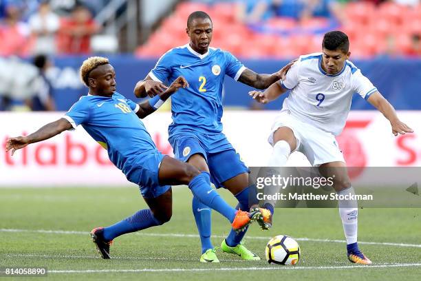 Elson Hooi and Dustley Mulder of Curacao battle for control of the ball against Nelson Bonilla of El Salvador in the first half during the 2017...