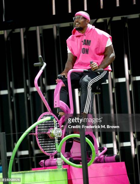 Player Von Miller rides exercise bike onstage during Nickelodeon Kids' Choice Sports Awards 2017 at Pauley Pavilion on July 13, 2017 in Los Angeles,...