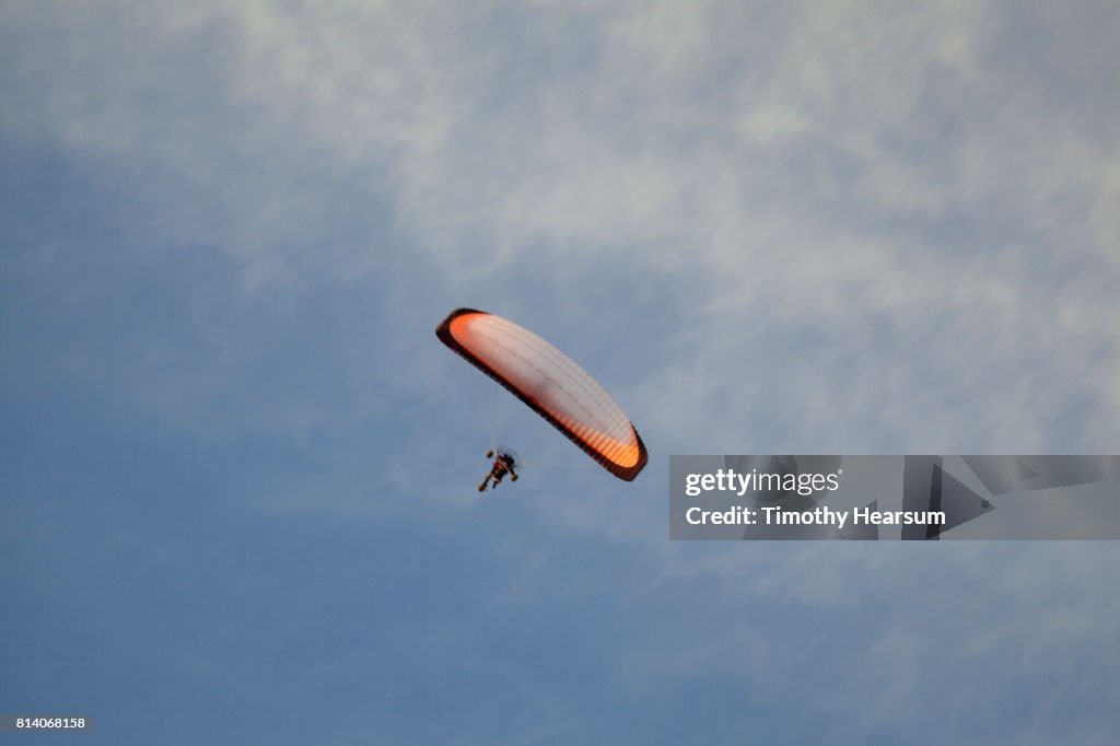 Single ultralight plane against the sky