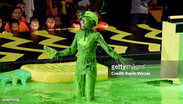 Actor Riele Downs participates in a competition onstage during Nickelodeon Kids' Choice Sports Awards 2017 at Pauley Pavilion on July 13, 2017 in Los...