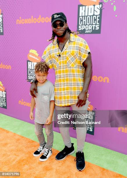 Player Jay Ajayi and a guest attend Nickelodeon Kids' Choice Sports Awards 2017 at Pauley Pavilion on July 13, 2017 in Los Angeles, California.