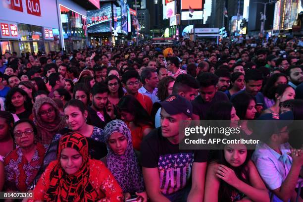 Fans wait to watch Bollywood movie stars during IIFA Stomp in the Times Square on July 13, 2017 to kick off the 18th International Indian Film...