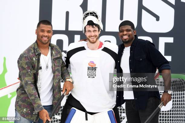 Host Russell Wilson, guest and P.K. Subban attend Nickelodeon Kids' Choice Sports Awards 2017 at Pauley Pavilion on July 13, 2017 in Los Angeles,...